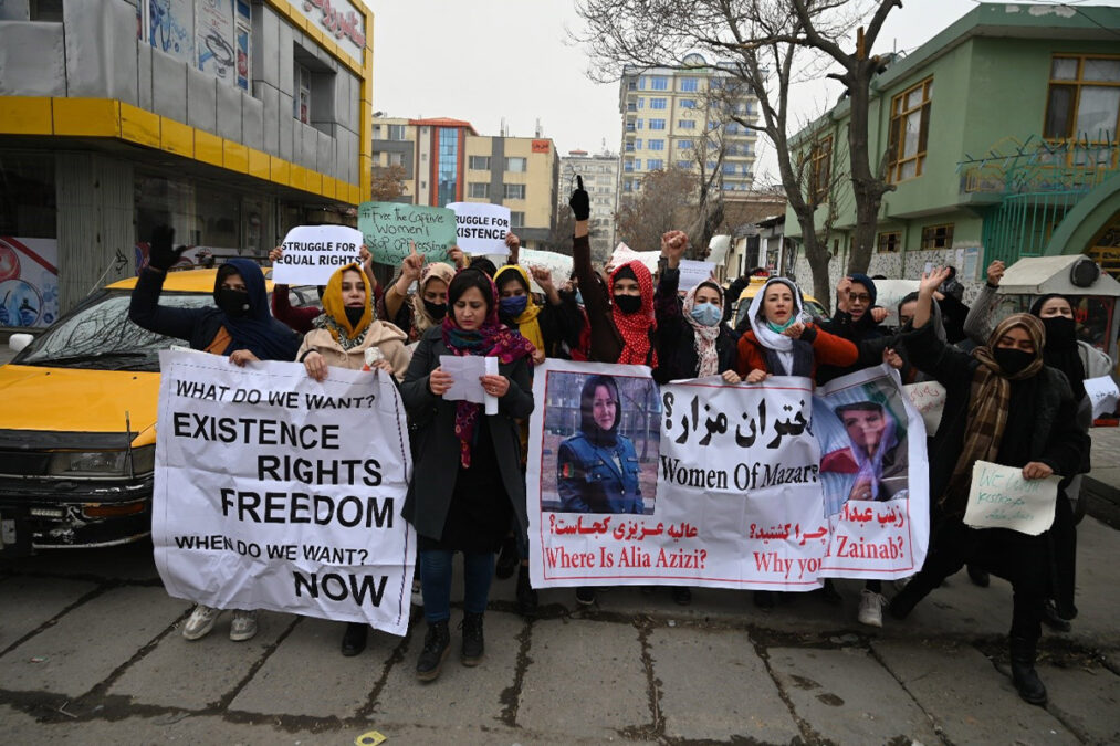 Afghan women attend a rally in Kabul on January 16, 2022, to protest the killing of former policewomen by Taliban.