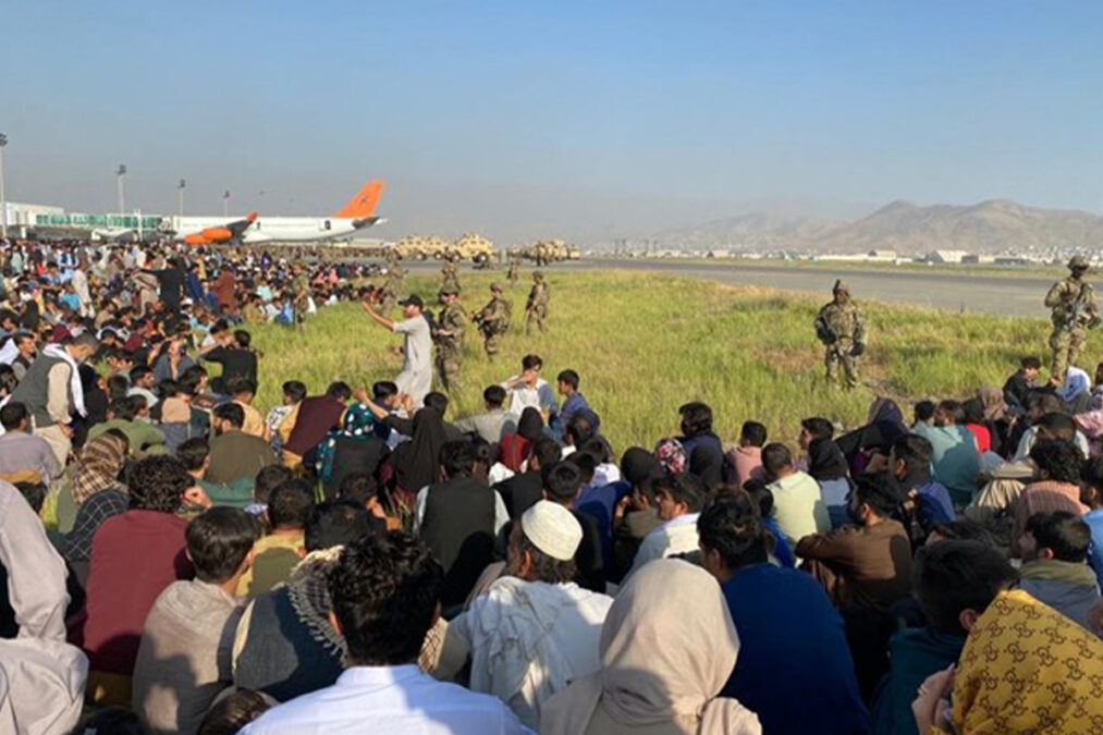 A large number of people waiting inside Kabul airport on August 16, 2021, a day after fall of the capital city to the Taliban.